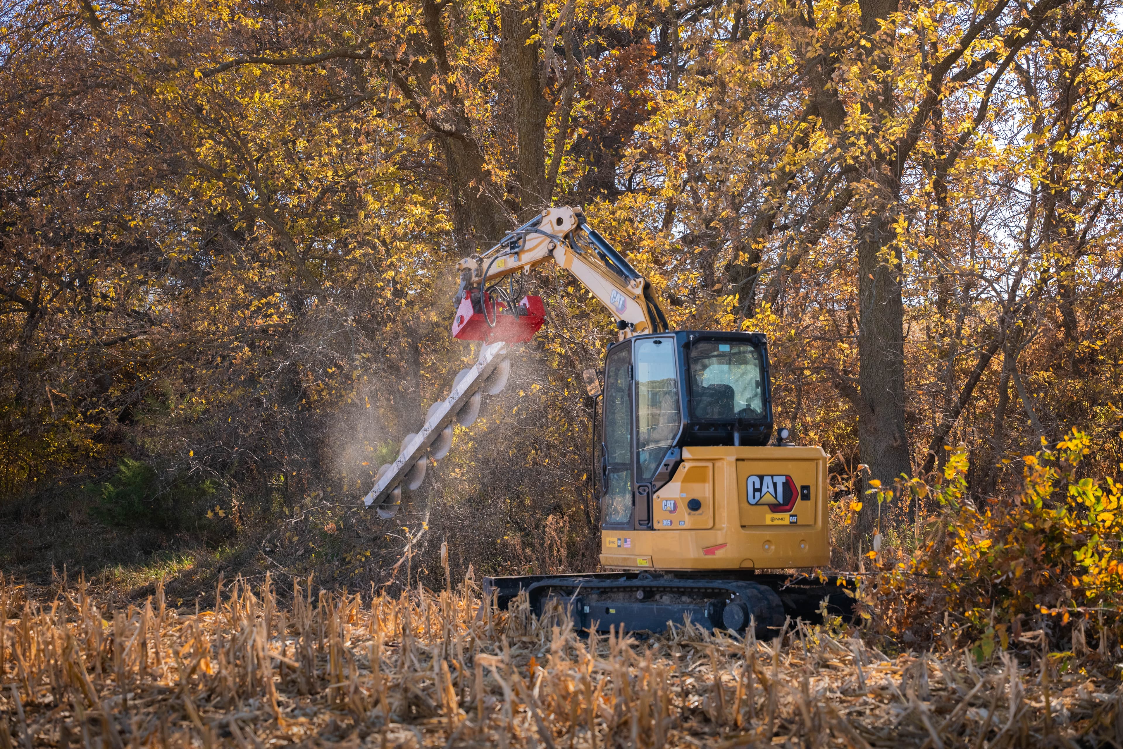 Picture of the OverlandSaw Machine in action cutting wood